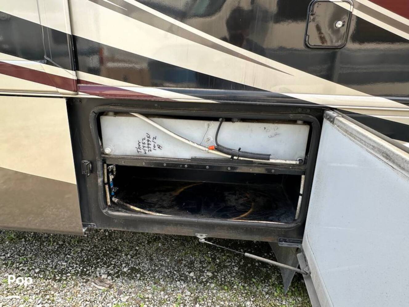 A photo of this 2013 Thor Motor Coach Challenger 37DT