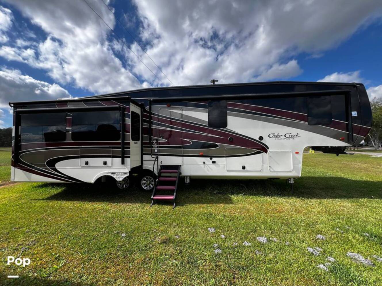 A photo of this 2019 Forest River Cedar Creek Champagne 38EL
