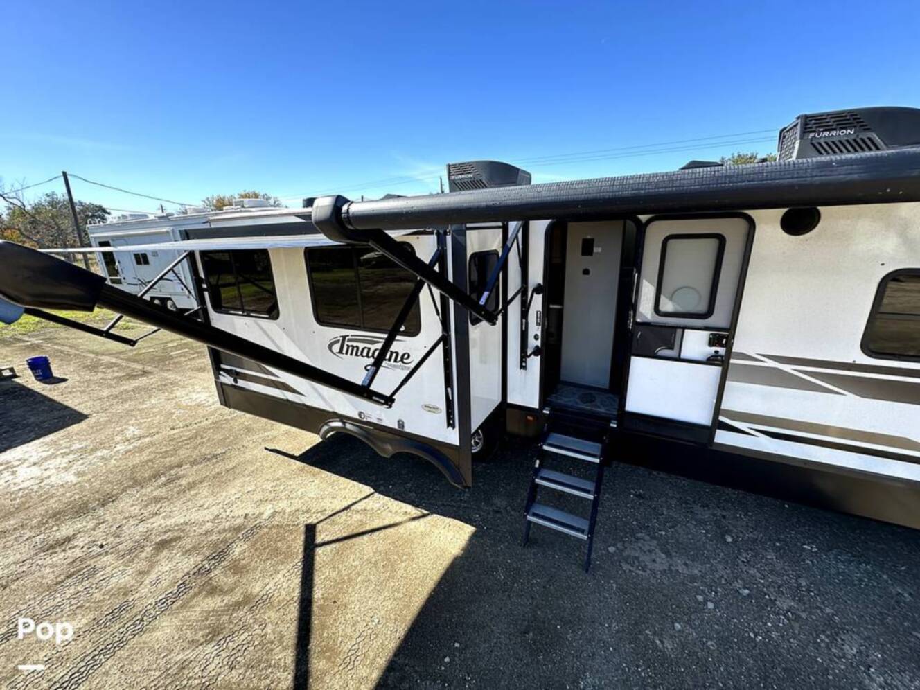 A photo of this 2022 Grand Design Imagine 2970RL