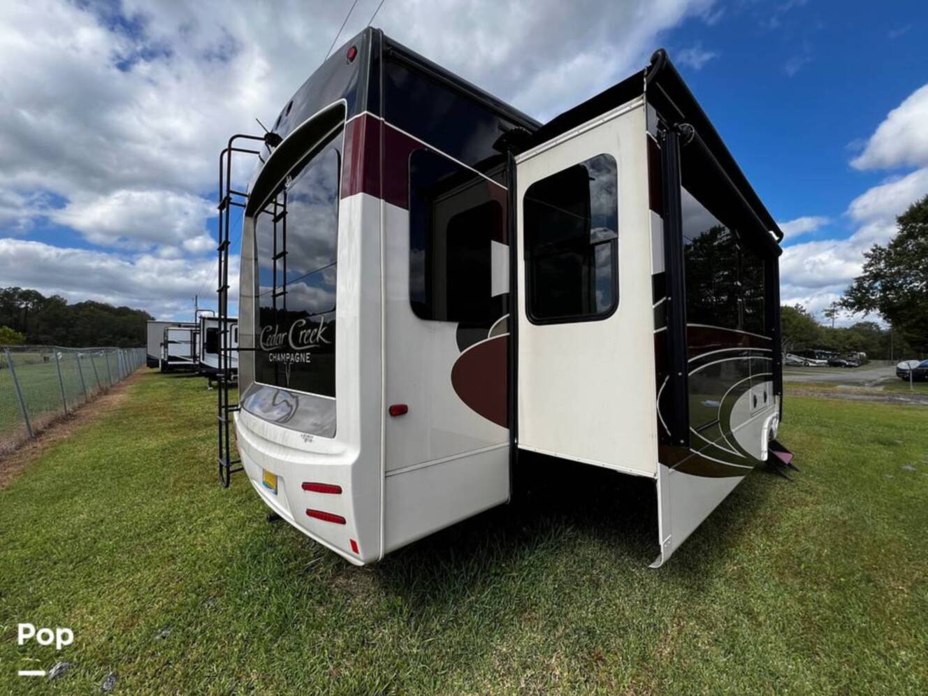 A photo of this 2019 Forest River Cedar Creek Champagne 38EL