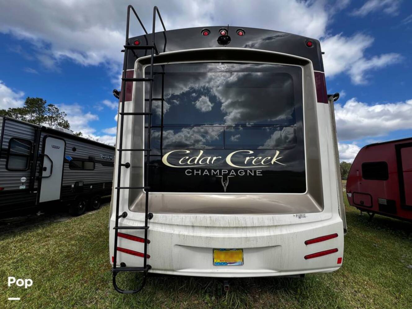 A photo of this 2019 Forest River Cedar Creek Champagne 38EL