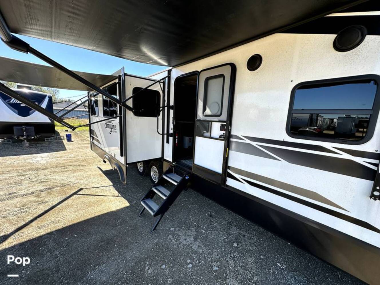 A photo of this 2022 Grand Design Imagine 2970RL