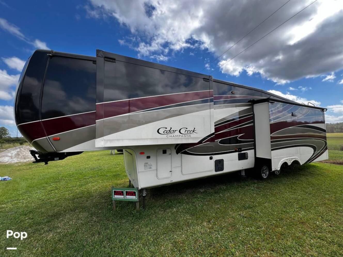 A photo of this 2019 Forest River Cedar Creek Champagne 38EL