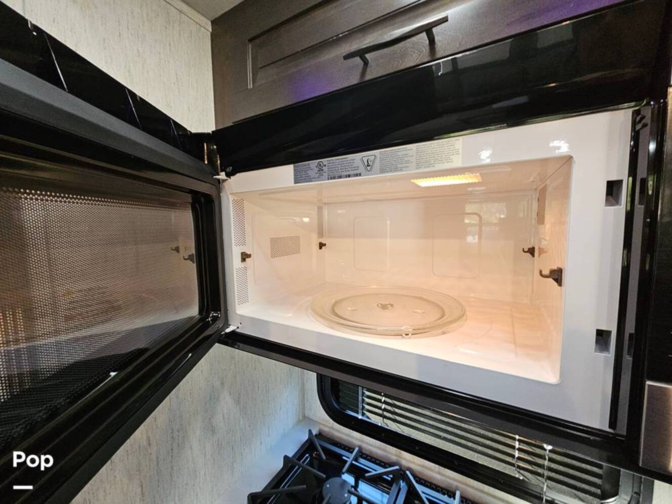 A photo of this 2023 Grand Design Momentum 398M
