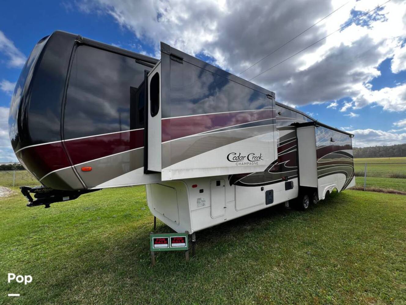 A photo of this 2019 Forest River Cedar Creek Champagne 38EL
