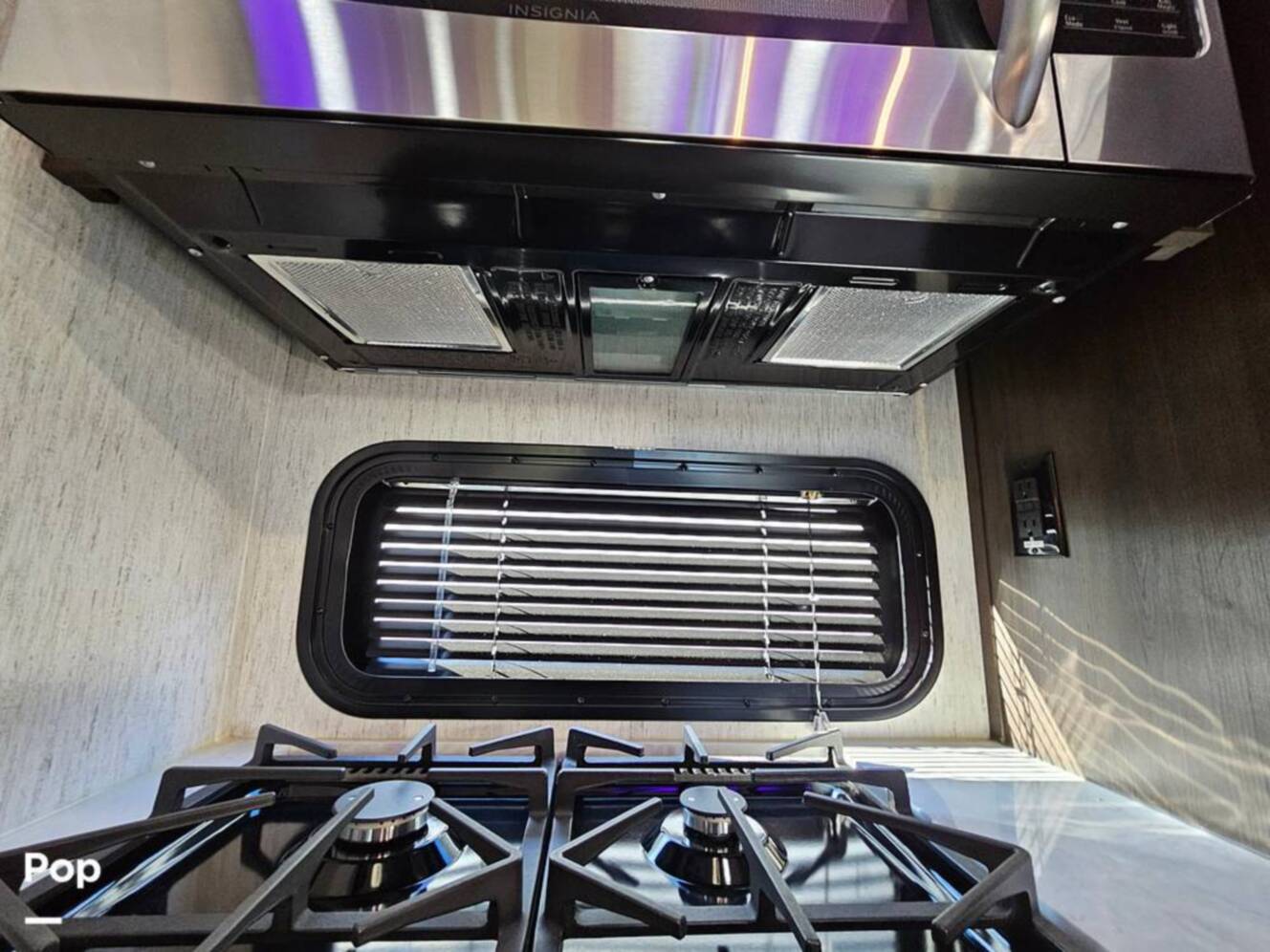 A photo of this 2023 Grand Design Momentum 398M