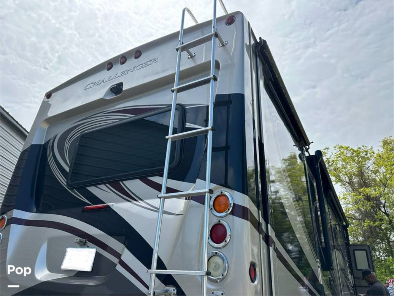A photo of this 2013 Thor Motor Coach Challenger 37DT