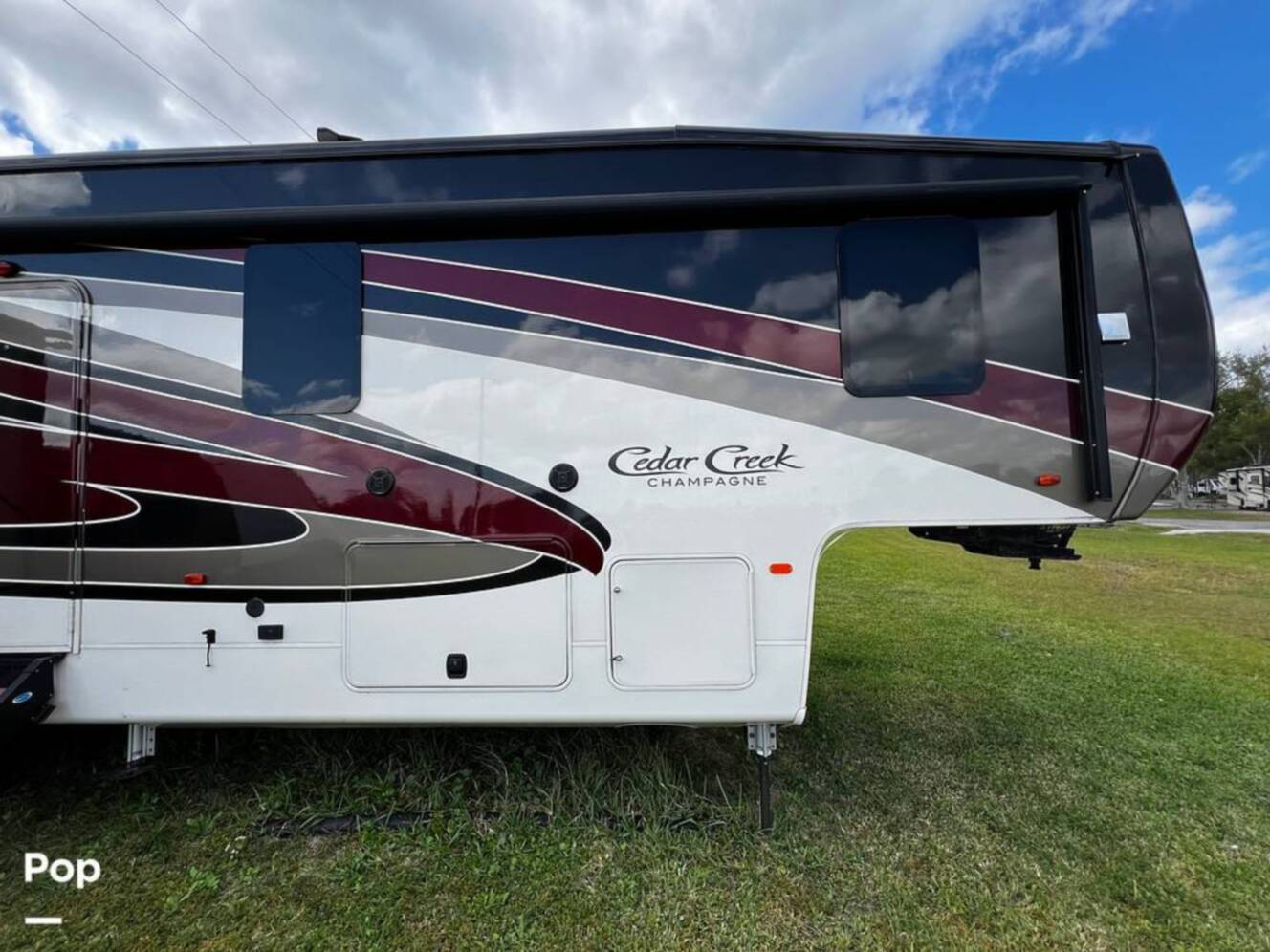 A photo of this 2019 Forest River Cedar Creek Champagne 38EL