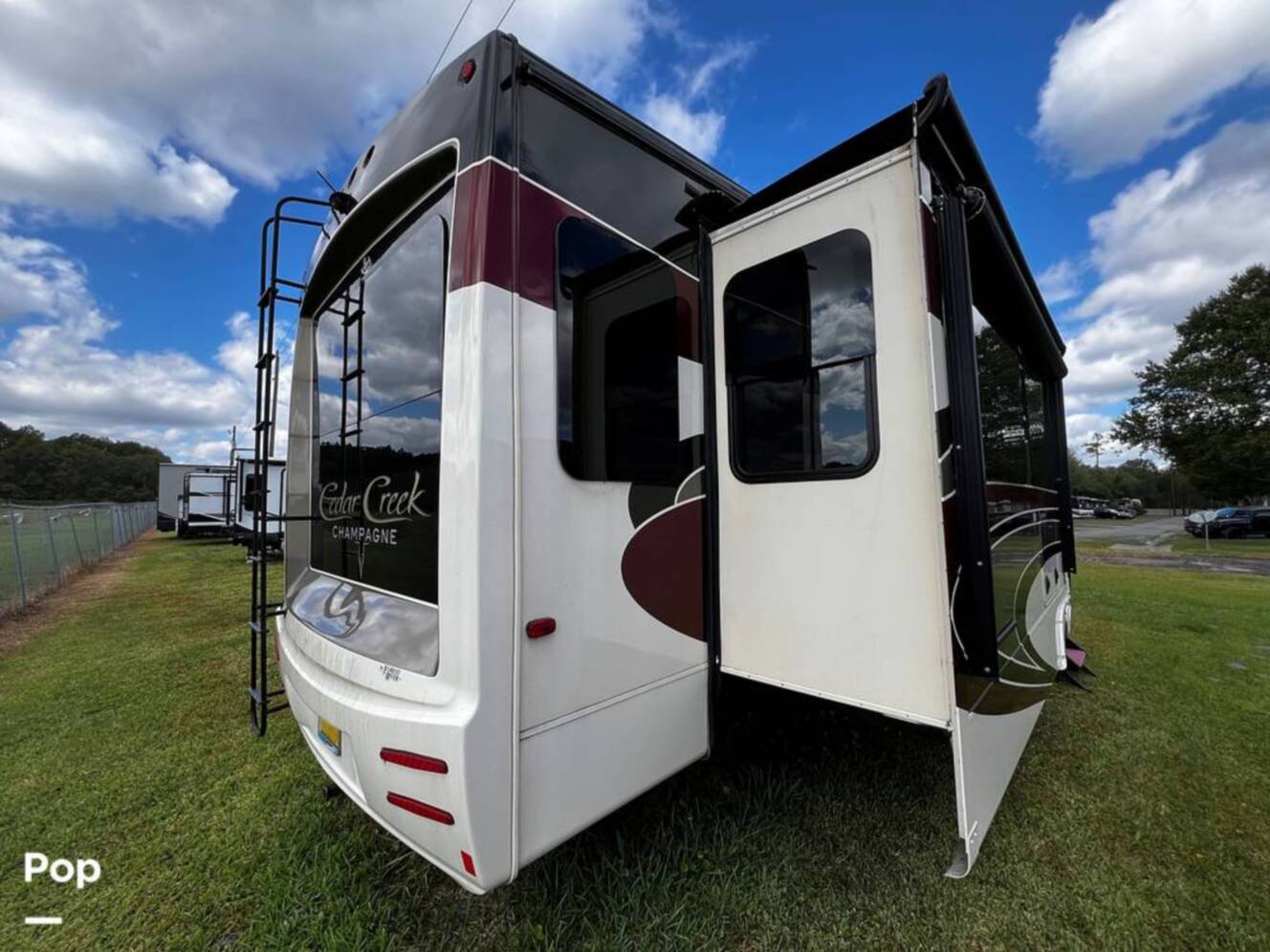 A photo of this 2019 Forest River Cedar Creek Champagne 38EL