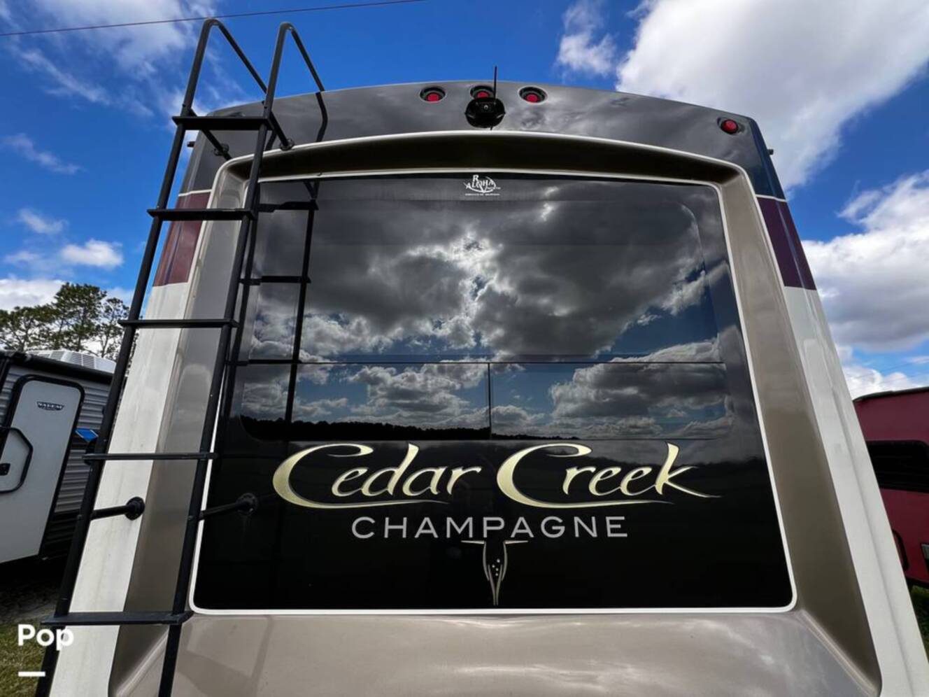 A photo of this 2019 Forest River Cedar Creek Champagne 38EL