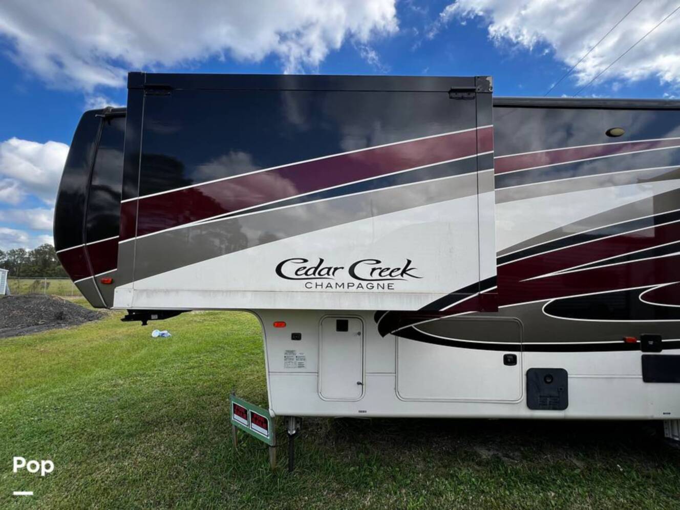 A photo of this 2019 Forest River Cedar Creek Champagne 38EL