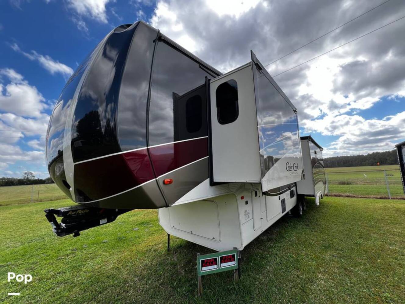 A photo of this 2019 Forest River Cedar Creek Champagne 38EL