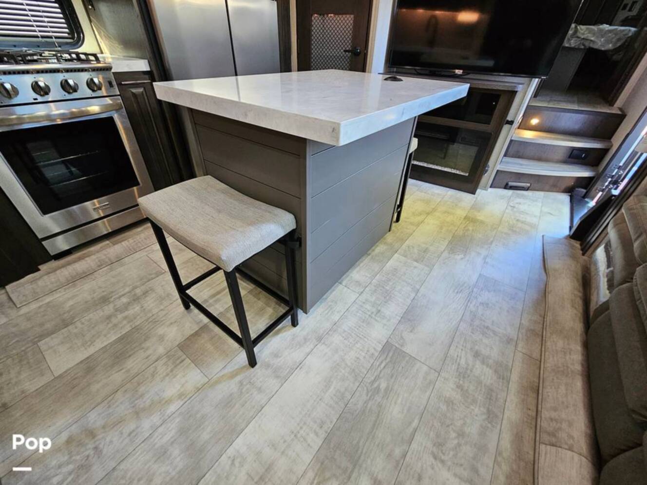 A photo of this 2023 Grand Design Momentum 398M