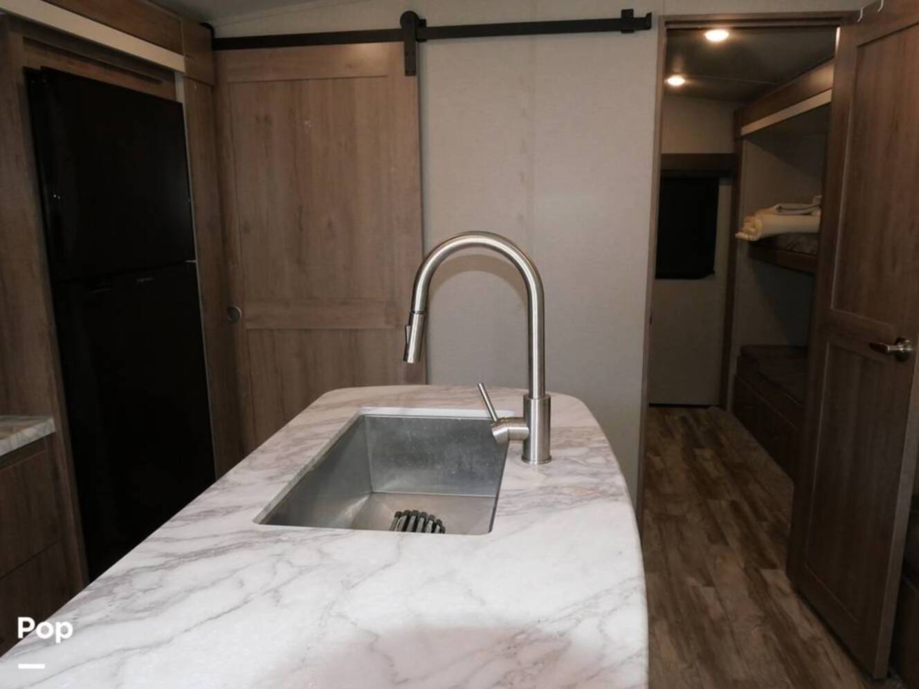 A photo of this 2022 Grand Design Imagine 3250BH