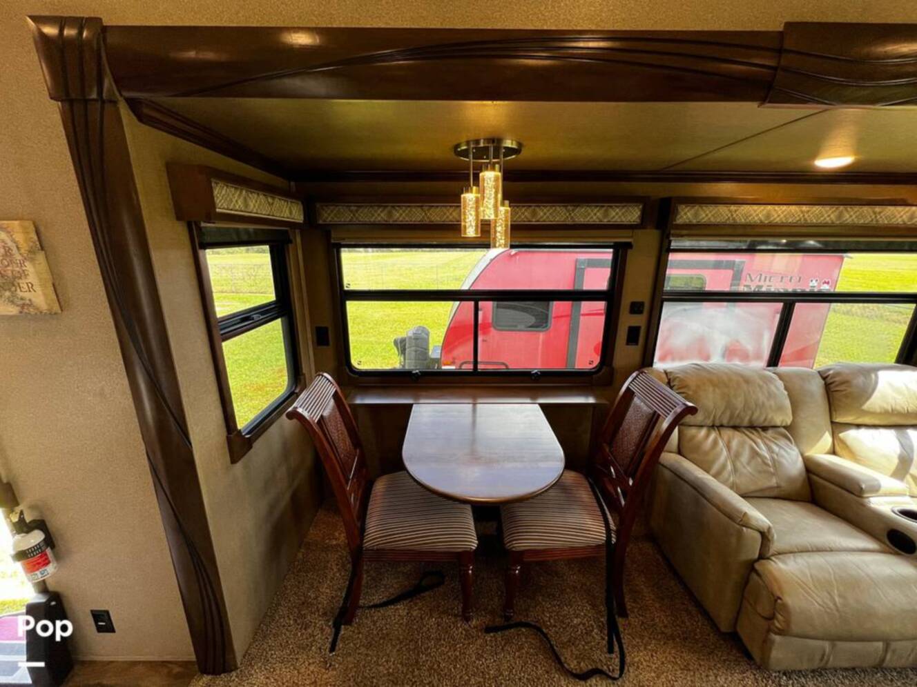 A photo of this 2019 Forest River Cedar Creek Champagne 38EL