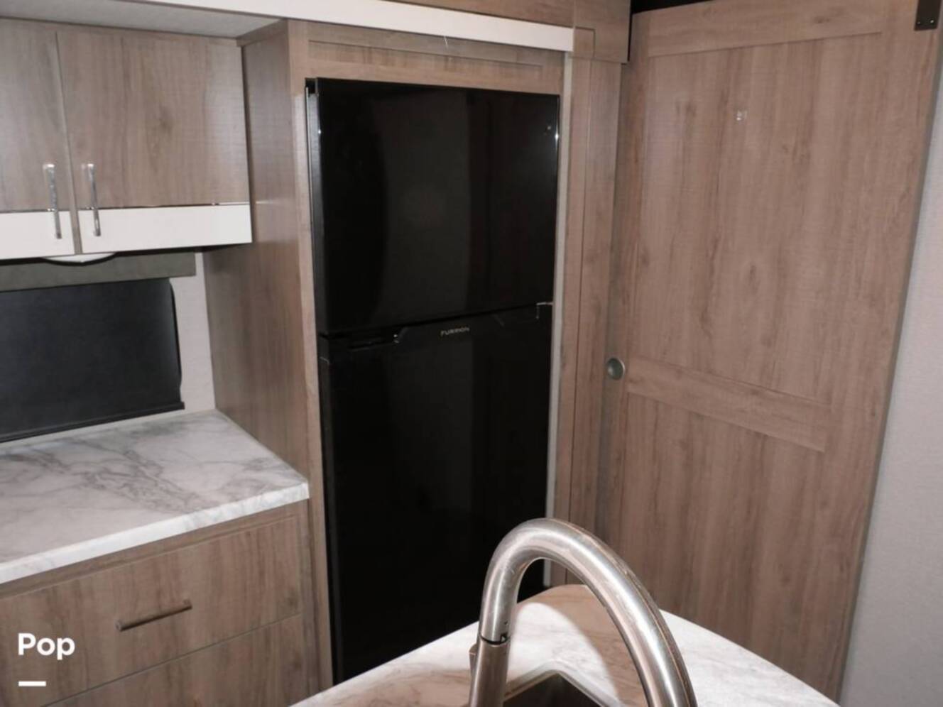 A photo of this 2022 Grand Design Imagine 3250BH