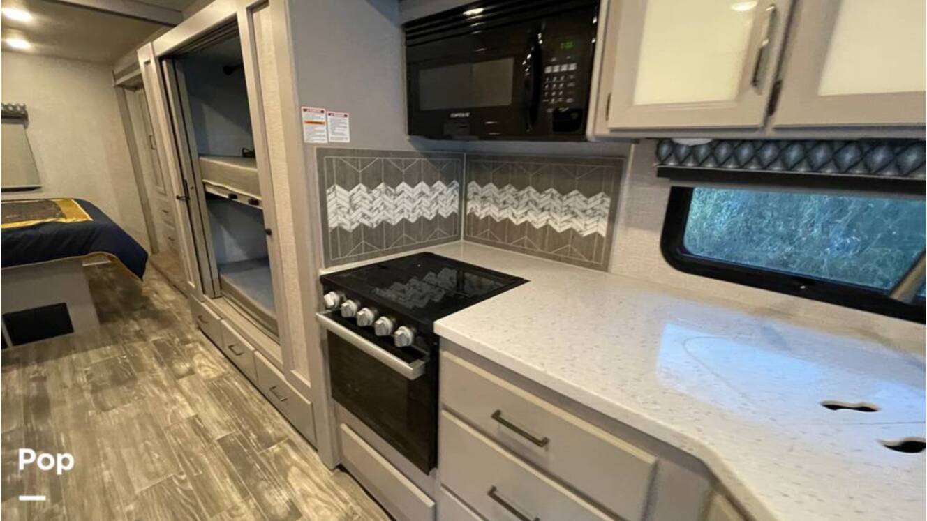 A photo of this 2023 Thor Motor Coach Hurricane 34J