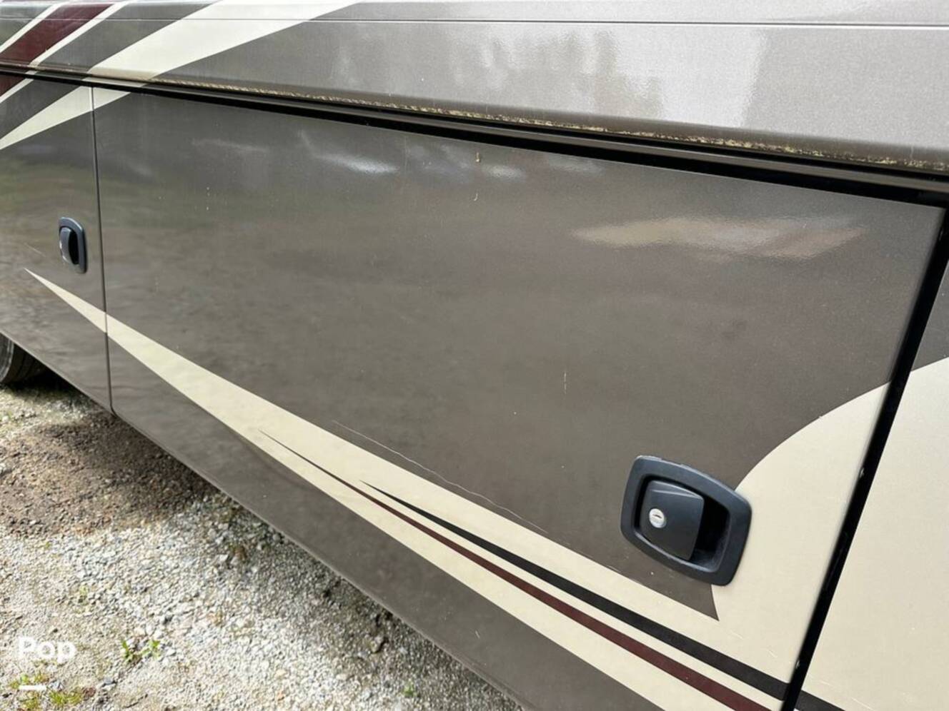 A photo of this 2013 Thor Motor Coach Challenger 37DT