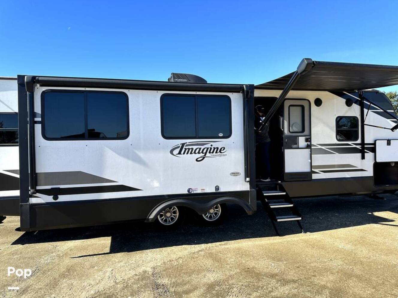 A photo of this 2022 Grand Design Imagine 2970RL
