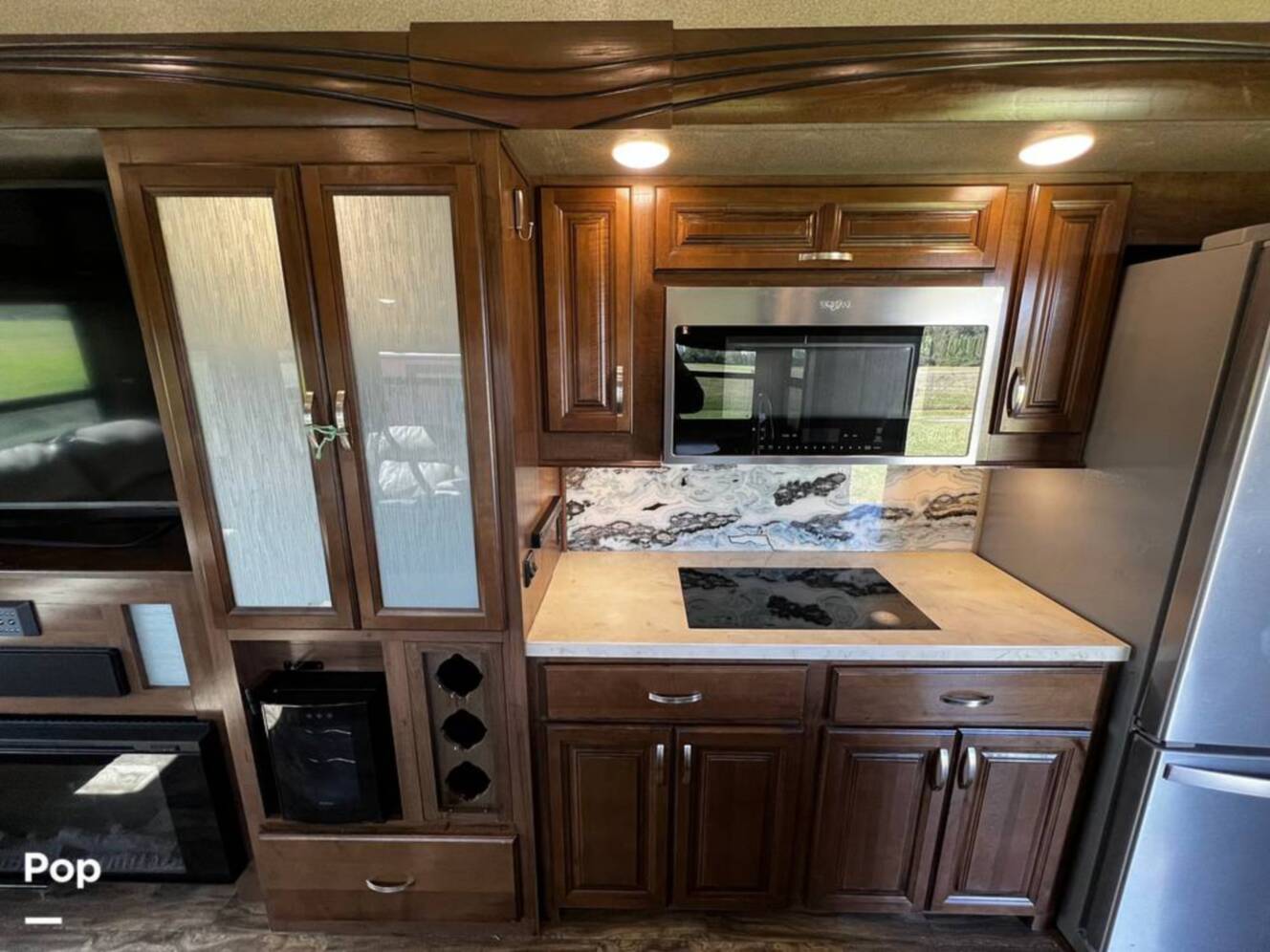 A photo of this 2019 Forest River Cedar Creek Champagne 38EL