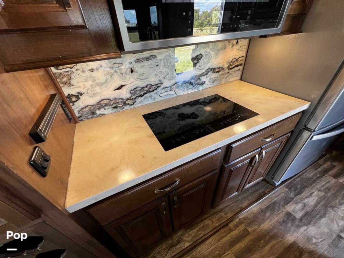 A photo of this 2019 Forest River Cedar Creek Champagne 38EL
