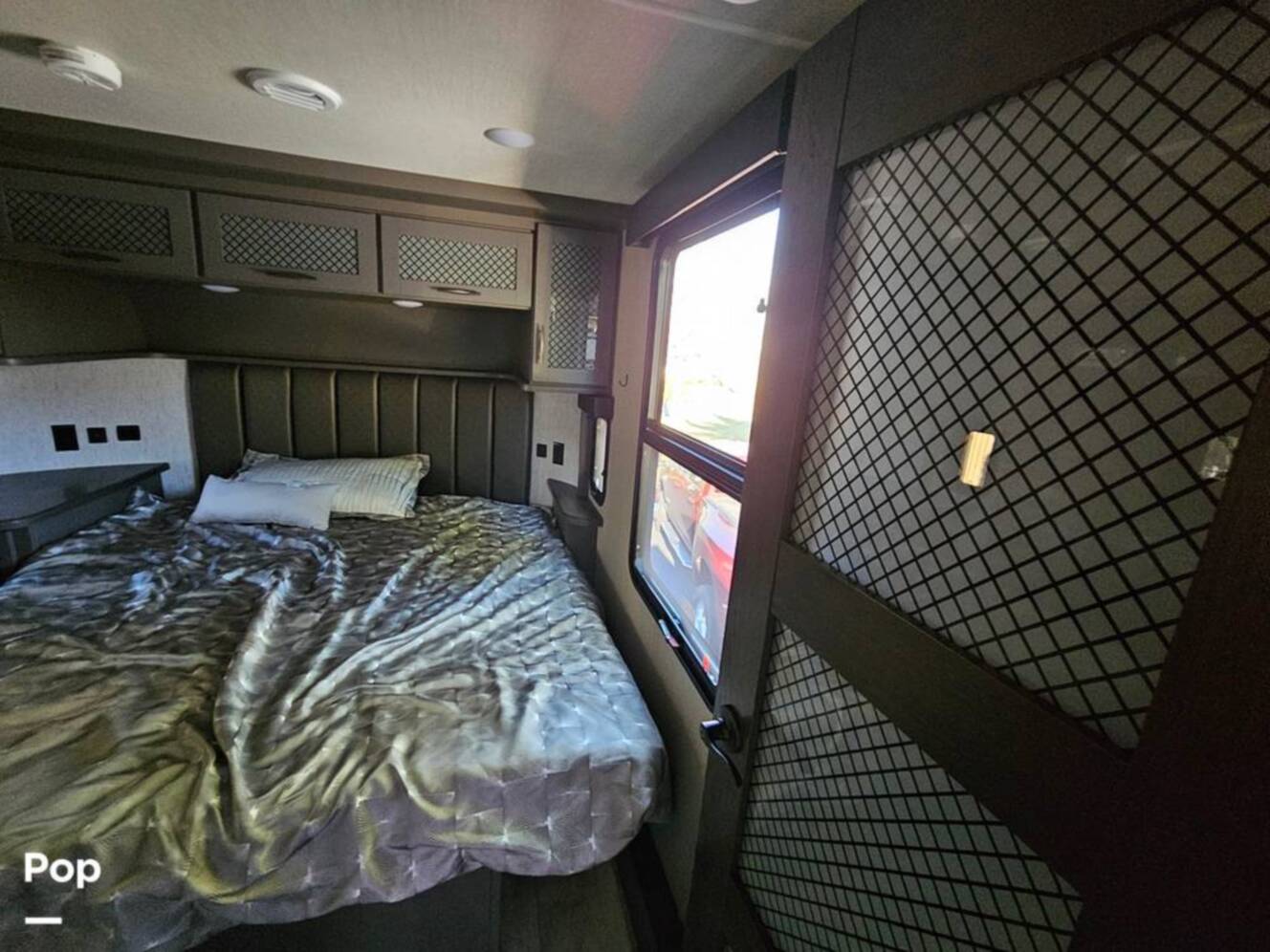 A photo of this 2023 Grand Design Momentum 398M