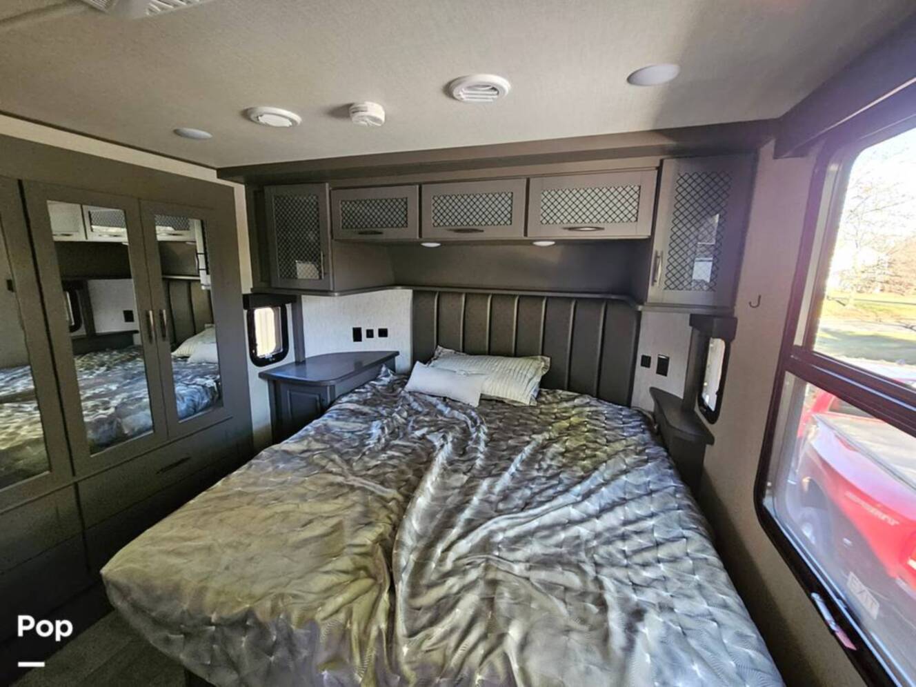 A photo of this 2023 Grand Design Momentum 398M