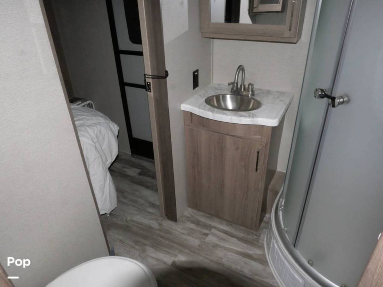 A photo of this 2022 Grand Design Imagine 3250BH