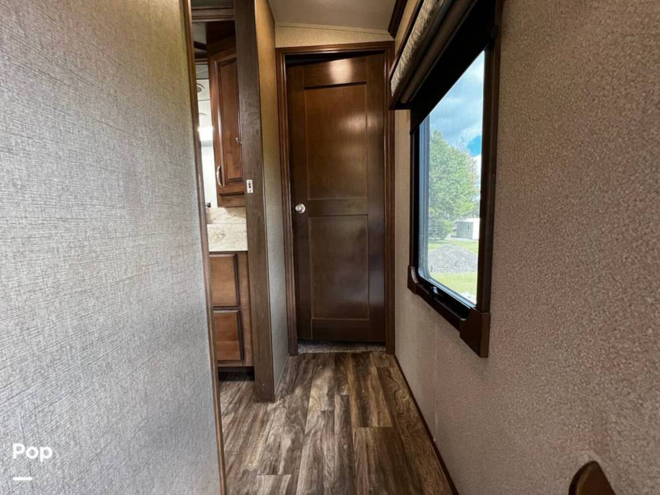 A photo of this 2019 Forest River Cedar Creek Champagne 38EL