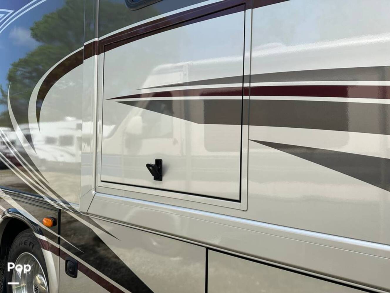 A photo of this 2013 Thor Motor Coach Challenger 37DT