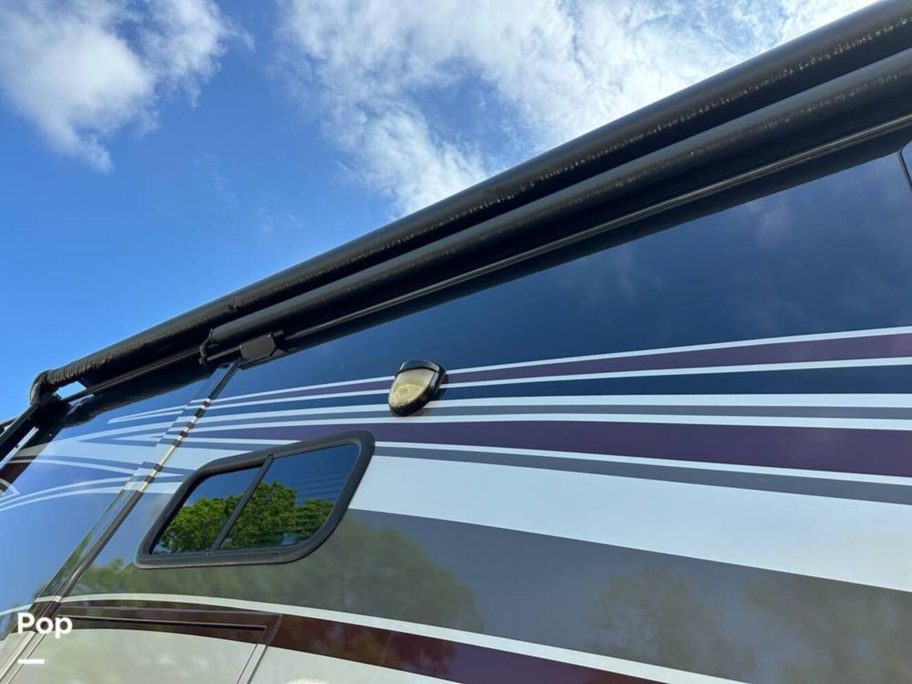 A photo of this 2013 Thor Motor Coach Challenger 37DT