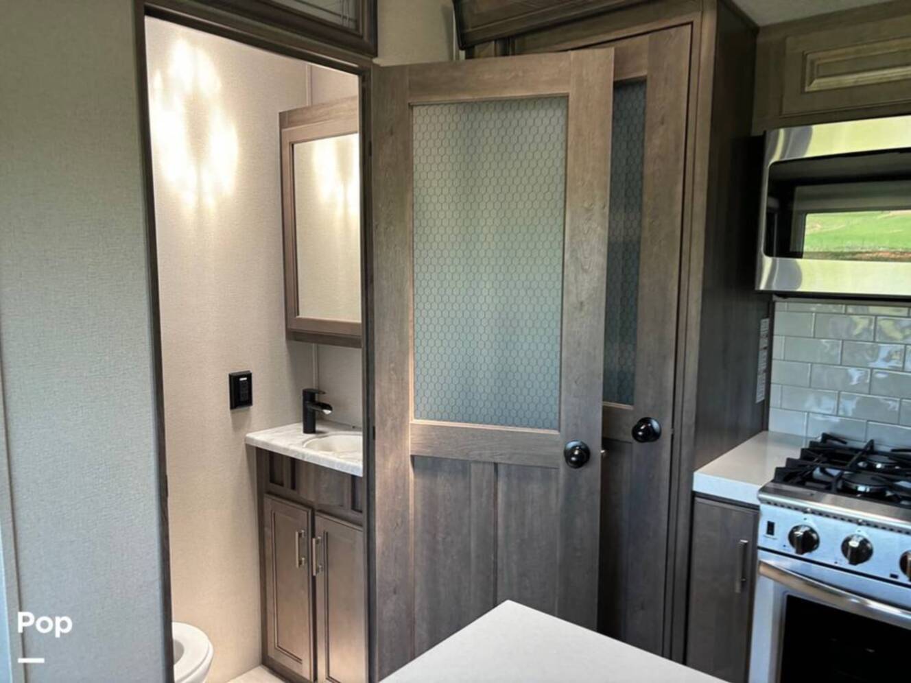 A photo of this 2021 Grand Design Solitude 380FL-R