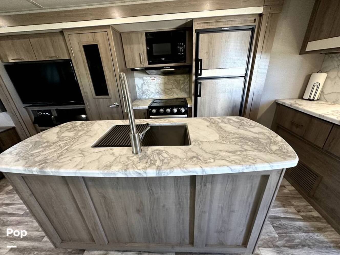 A photo of this 2022 Grand Design Imagine 2970RL