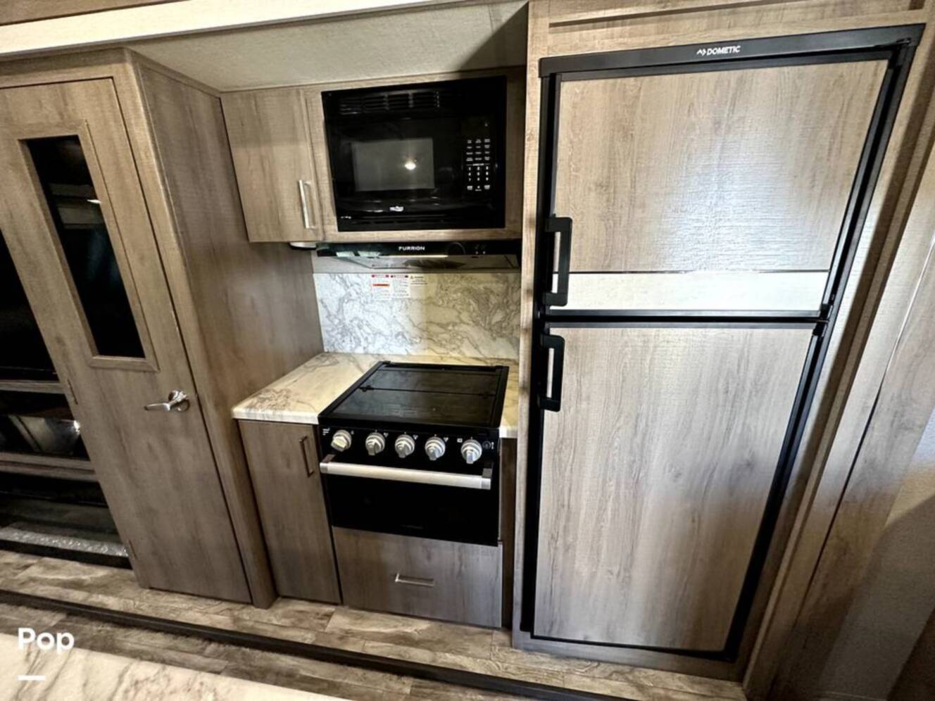 A photo of this 2022 Grand Design Imagine 2970RL