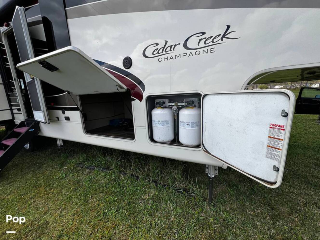 A photo of this 2019 Forest River Cedar Creek Champagne 38EL