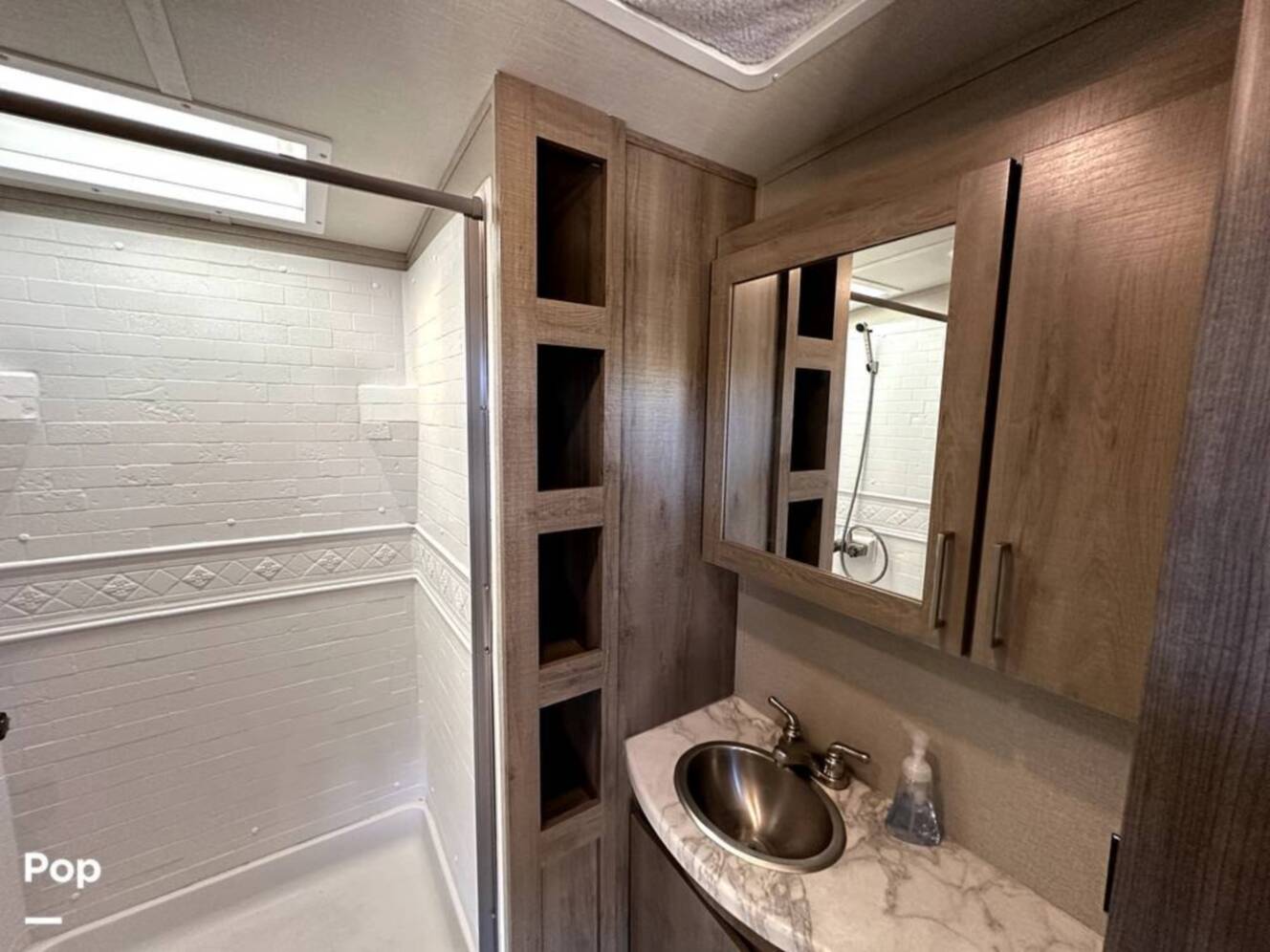 A photo of this 2022 Grand Design Imagine 2970RL