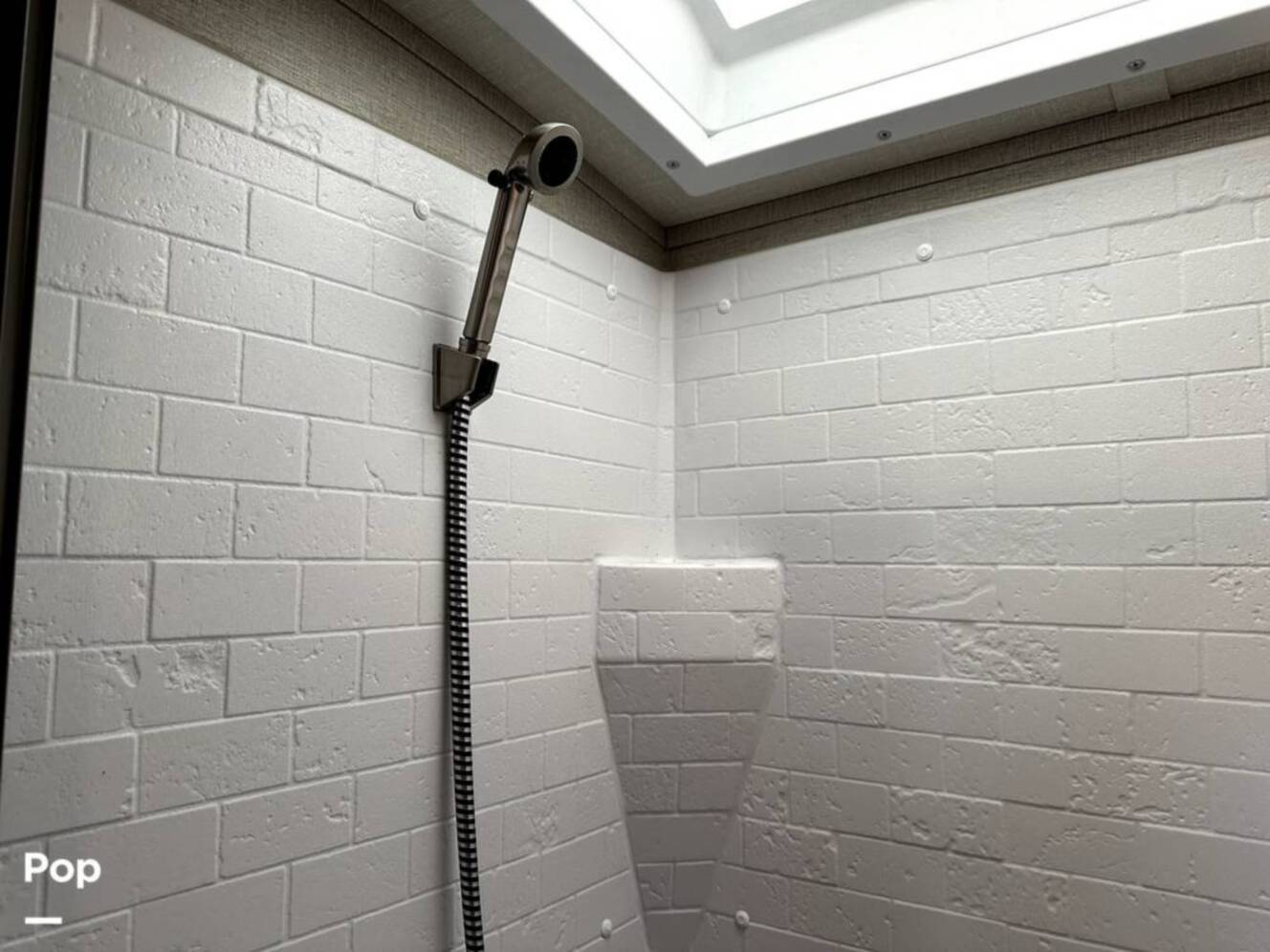 A photo of this 2022 Grand Design Imagine 2970RL