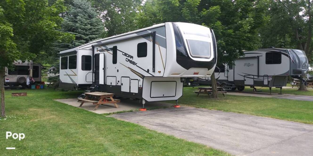A photo of this 2021 Forest River Cedar Creek 377BH