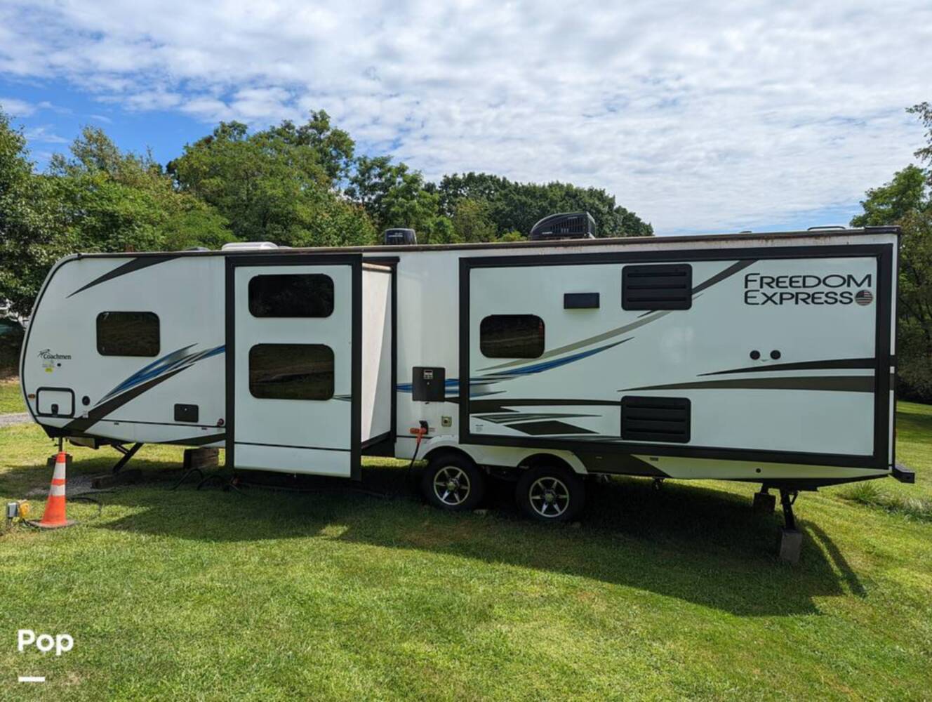A photo of this 2021 Coachmen Freedom Express 323 BHDS