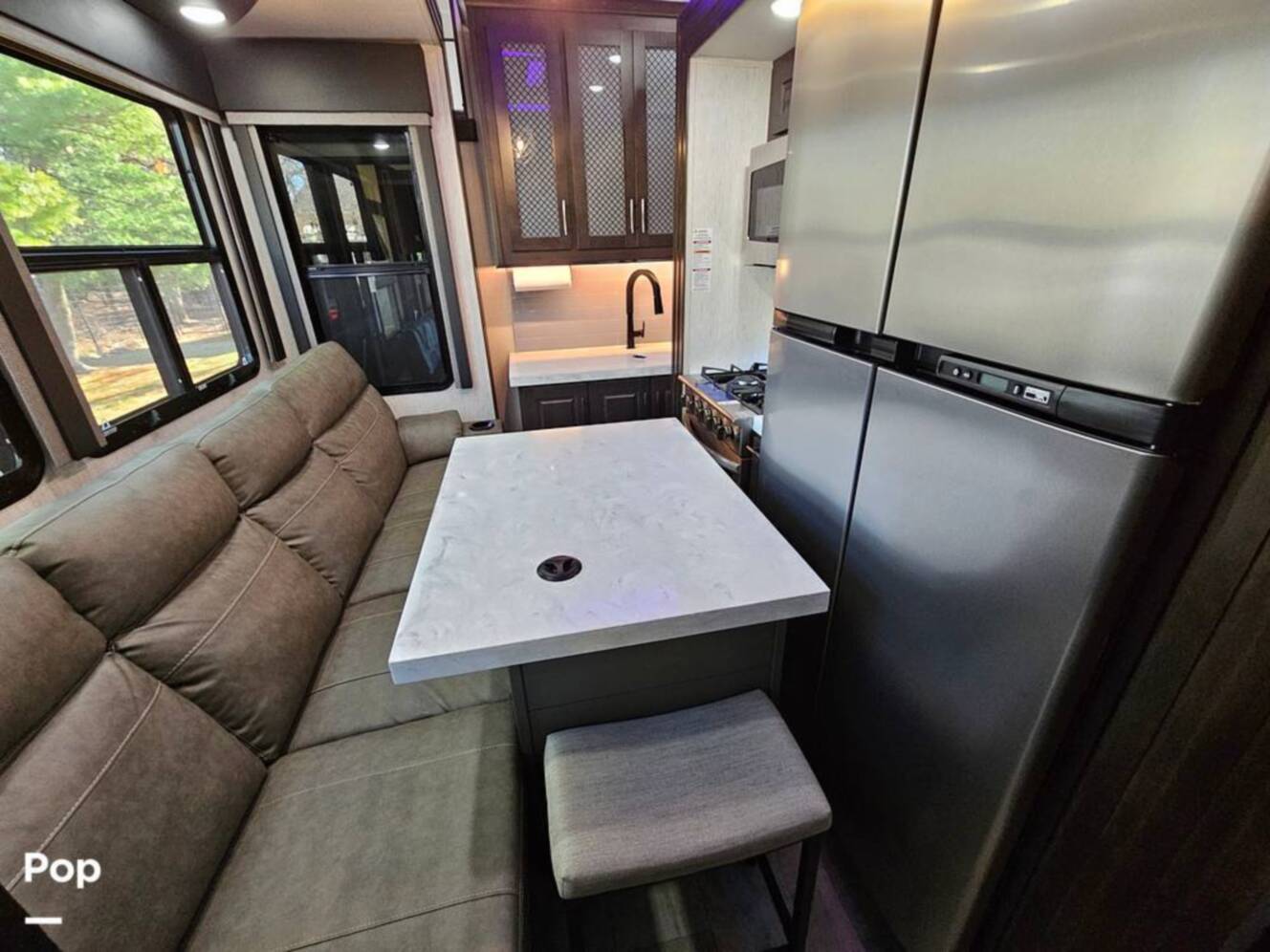 A photo of this 2023 Grand Design Momentum 398M