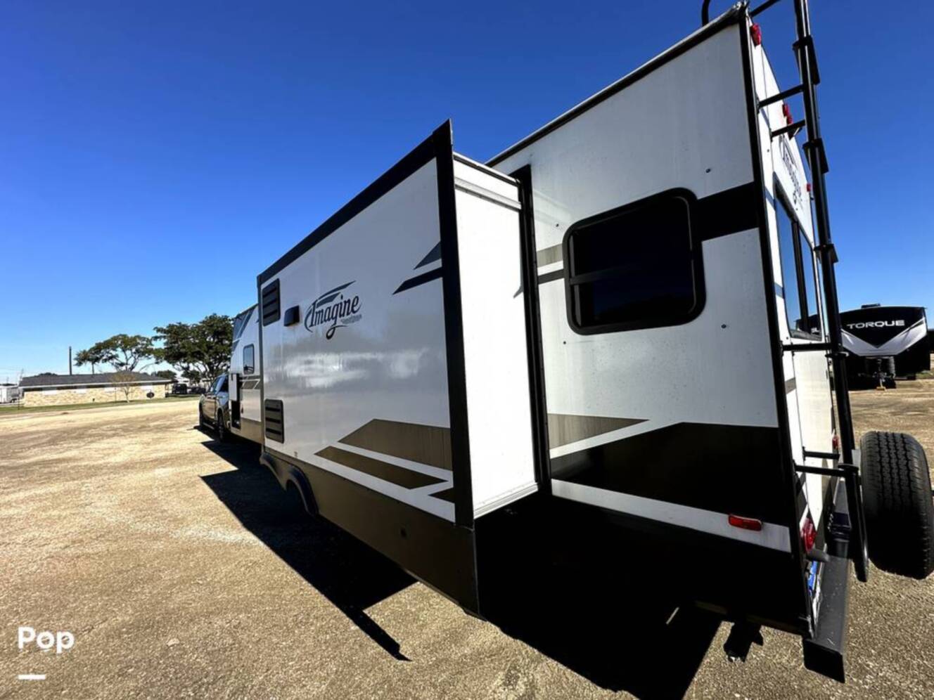 A photo of this 2022 Grand Design Imagine 2970RL