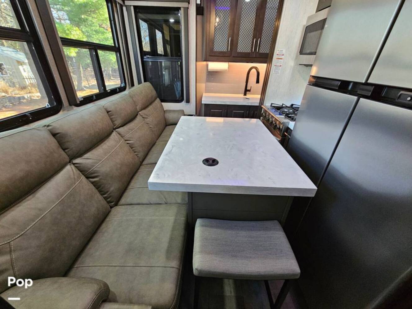 A photo of this 2023 Grand Design Momentum 398M