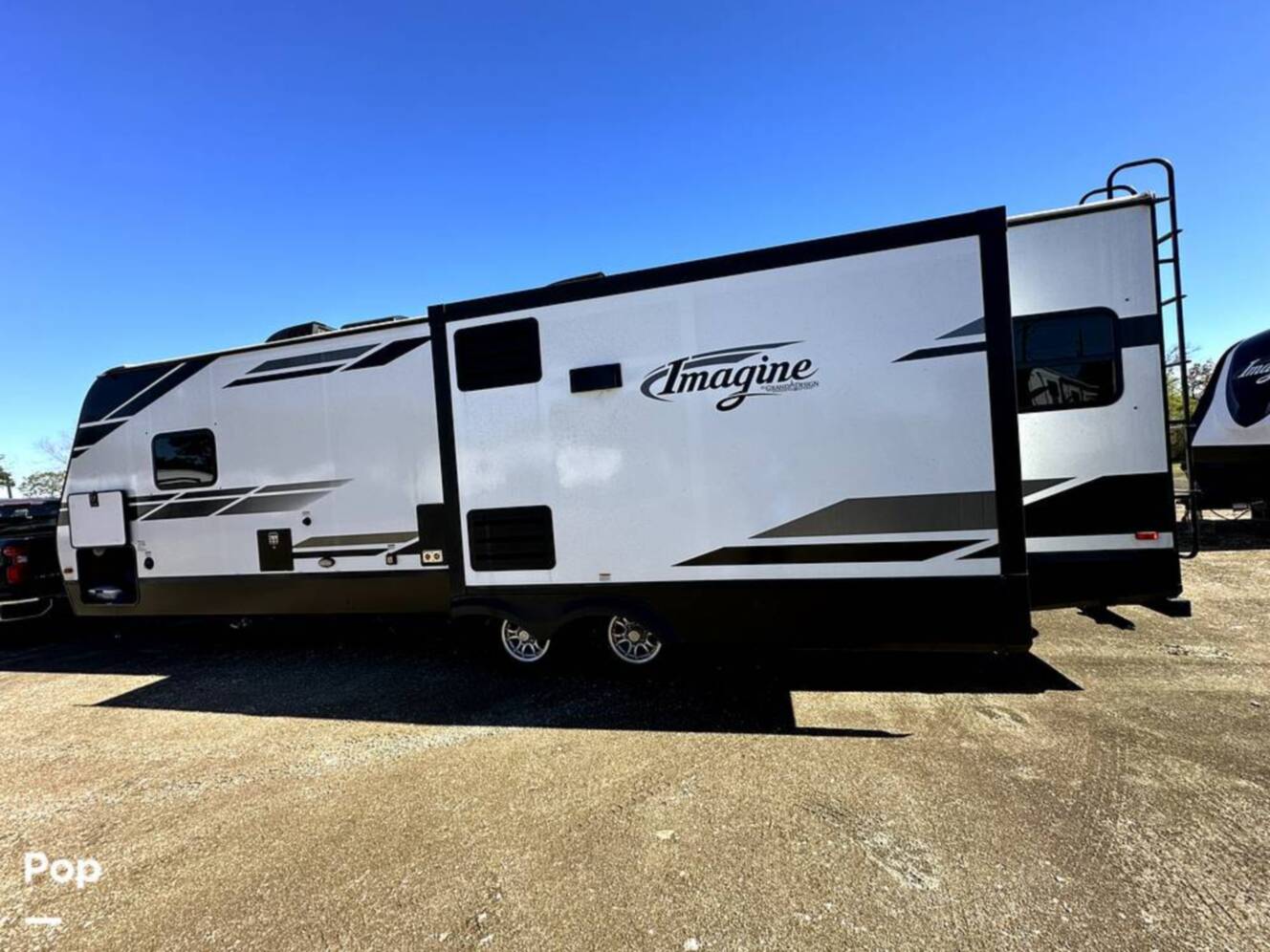 A photo of this 2022 Grand Design Imagine 2970RL