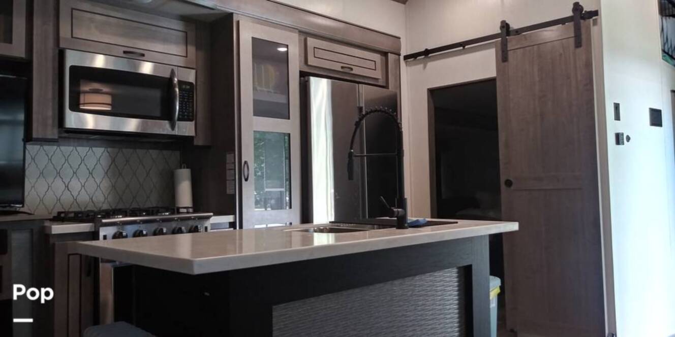 A photo of this 2021 Forest River Cedar Creek 377BH
