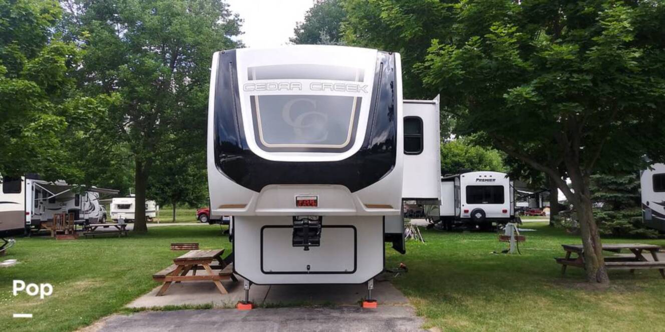 A photo of this 2021 Forest River Cedar Creek 377BH