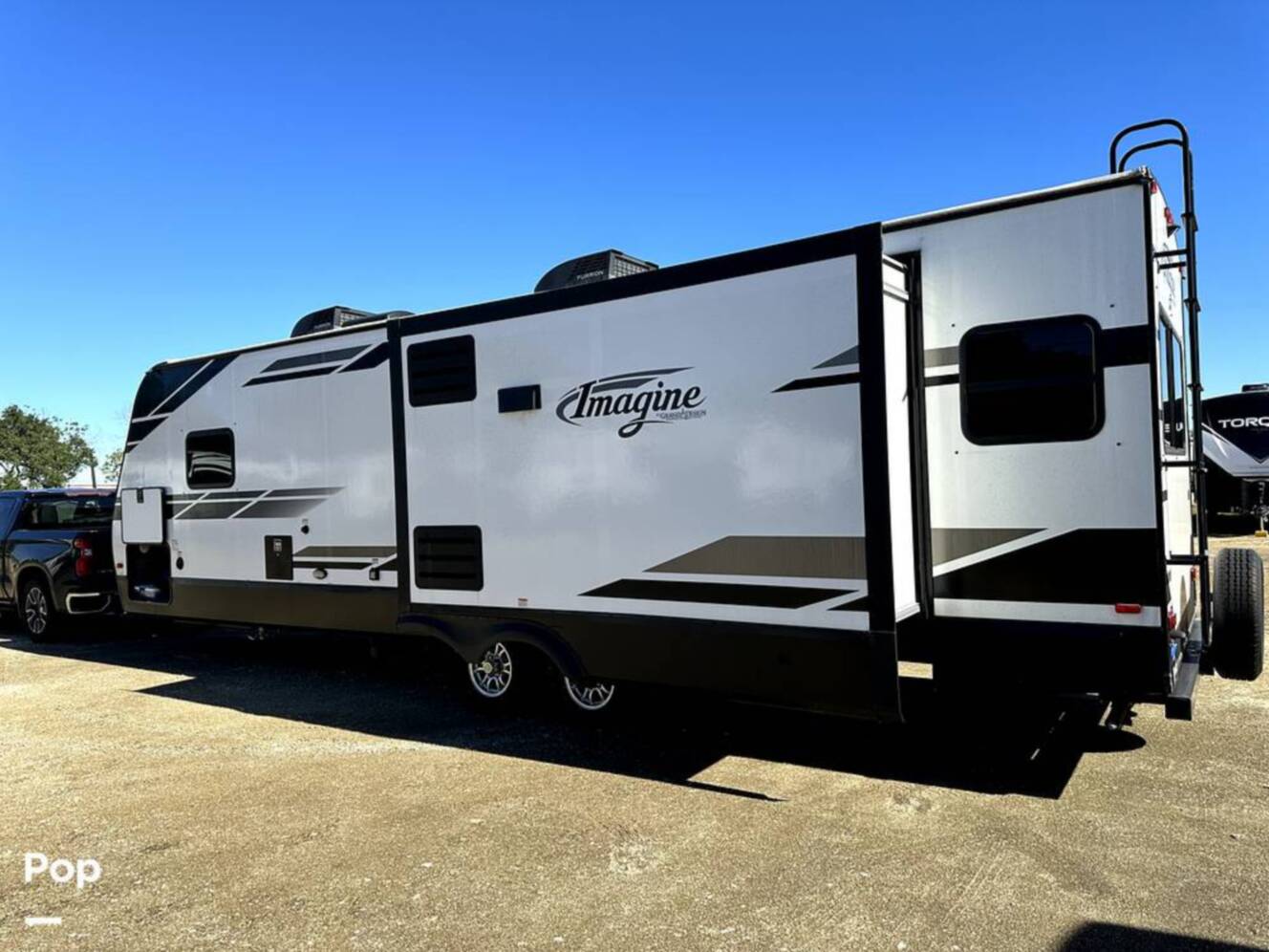 A photo of this 2022 Grand Design Imagine 2970RL