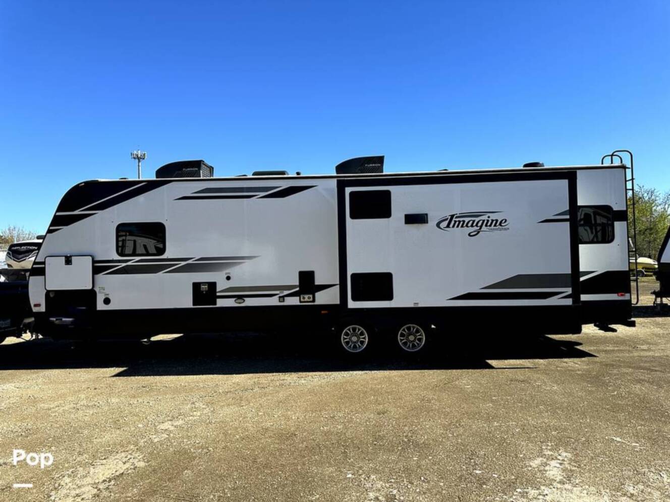 A photo of this 2022 Grand Design Imagine 2970RL