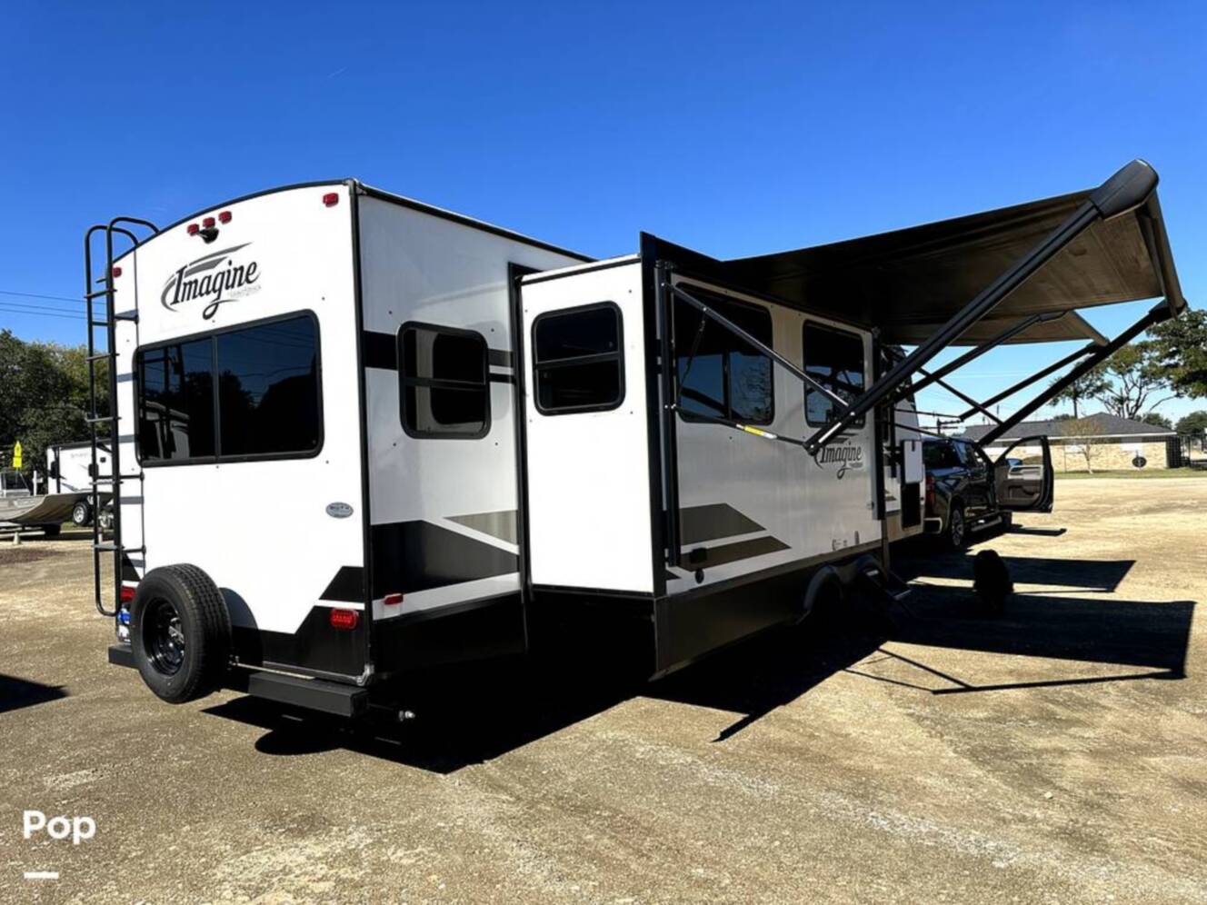 A photo of this 2022 Grand Design Imagine 2970RL