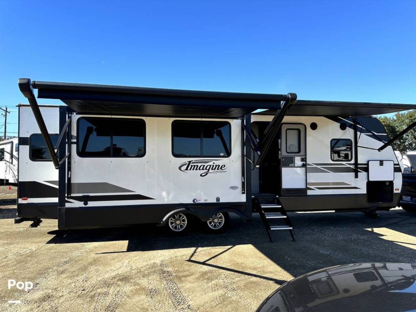 A photo of this 2022 Grand Design Imagine 2970RL