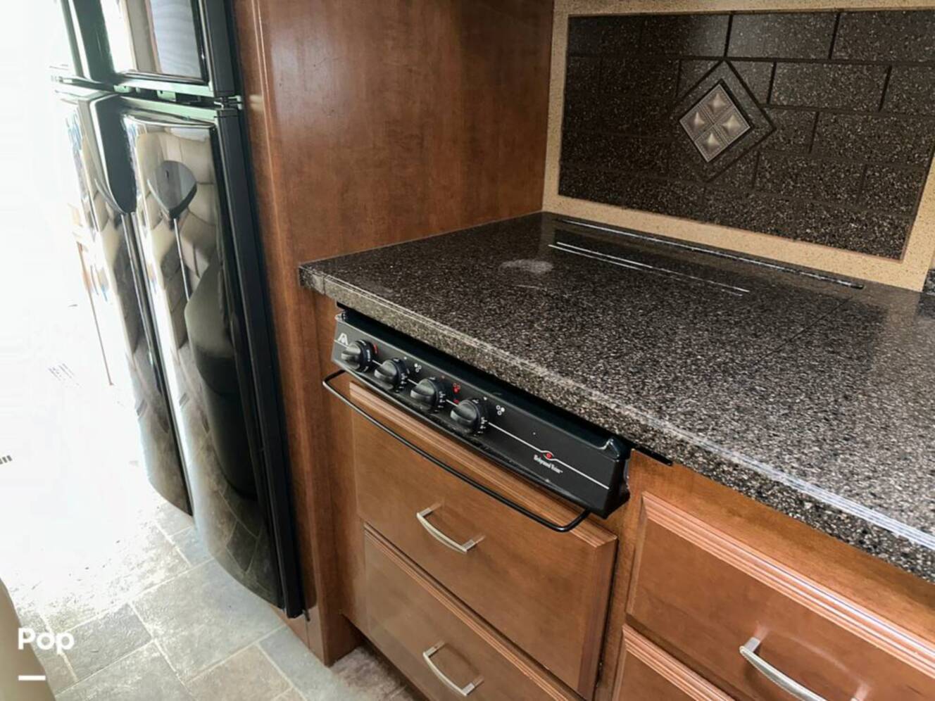 A photo of this 2013 Thor Motor Coach Challenger 37DT